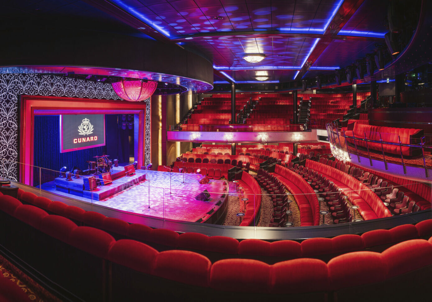 Interior of the Royal Court Theatre on board Queen Mary 2.
NOTE: This version is full resolution.
Client: Cunard.
Picture date: Friday October 14, 2022.
Photograph by Christopher Ison ©
07544044177
chris@christopherison.com
www.christopherison.com

IMPORTANT NOTE REGARDING IMAGE LICENCING FOR THIS PHOTOGRAPH: 
Agreement title: For Cunard and third parties - Chris Ison photography
Agreement: This image is for Cunard and third parties, can be used in all markets, all channels and expires on 15 October 2027.  No sales are permitted unless expressly agreed in writing with the photographer.