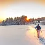 Sonnige Winterlandschaft mit Mann auf Schneeschuhen. - © Lukas Gojda - stock.adobe.com