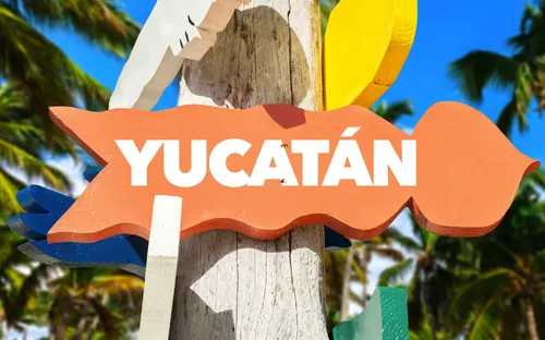 Yucatan - Willkommensschild mit Palmen